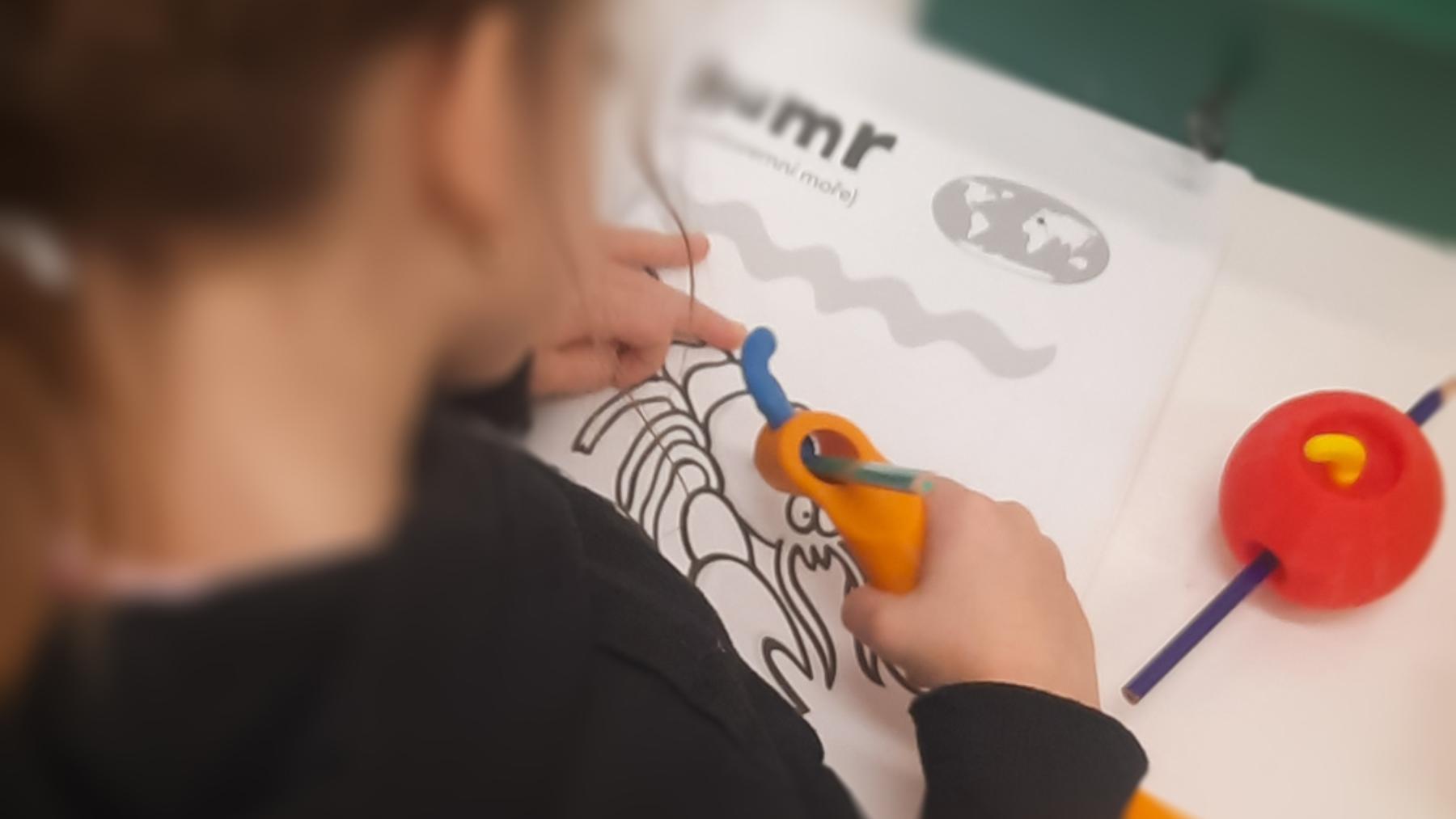 Aids made to fit children’s hands. CXI TUL developers helped create them for a special-needs nursery school